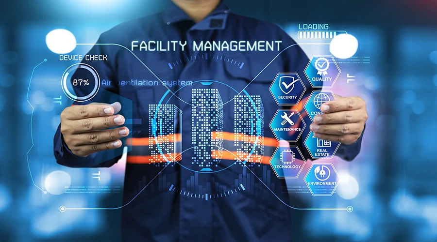 Facility management concept with holographic interface showing building systems, maintenance, security, quality, technology, real estate, and environment solutions